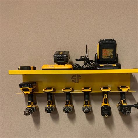 drilled metal bracket|cordless drill organizer hanging.